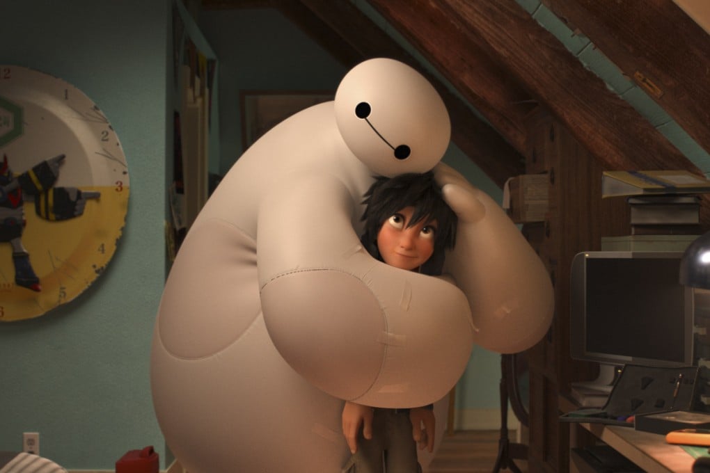 The eminently huggable Baymax and tech prodigy Hiro in the animation film Big Hero 6. Photo: Disney handout
