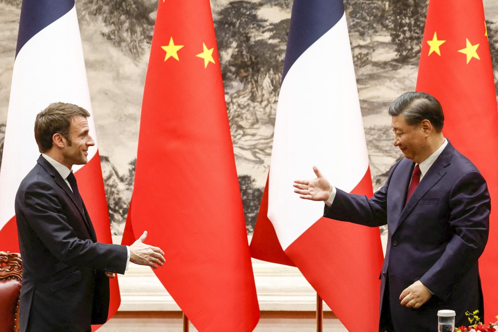 Chinese President Xi Jinping and French President Emmanuel Macron shake hands at the Great Hall of the People, in Beijing, China, April 6, 2023. Photo: Reuters