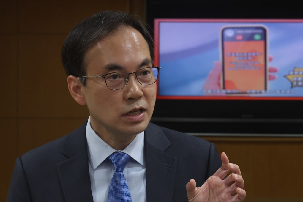 Chaucer Leung Chung-yin, the director general of communications for the Office of the Communications Authority, discussing measures to combat fraudulent calls. Photo: SCMP/Edmond So