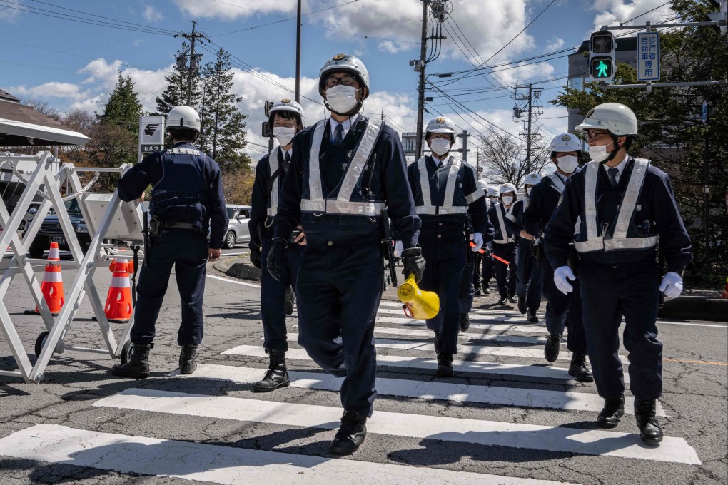 Police officers patrol a road near the venue of the G7 Foreign Ministers meeting in Karuizawa, Japan, on April 16, 2023. Photo: AFP