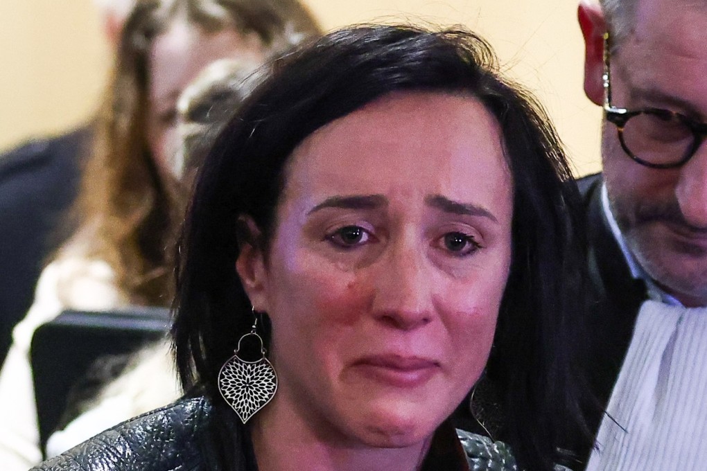 Ophelie Touillou, the sister of a victim of the 2009 Air France crash, reacts as she talks to the press about a court acquitting the firm and plane manufacturer Airbus of involuntary manslaughter charges. Photo: EPA-EFE