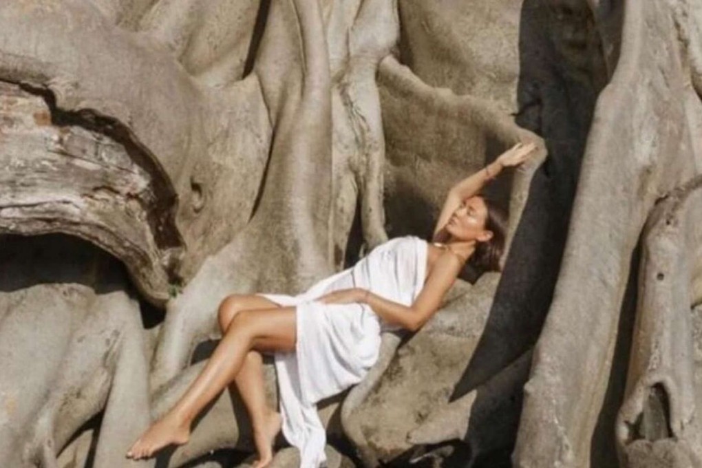 Russian tourist Luiza Kosykh says she did not know that the tree was sacred. Luiza Kosykh via Instagram