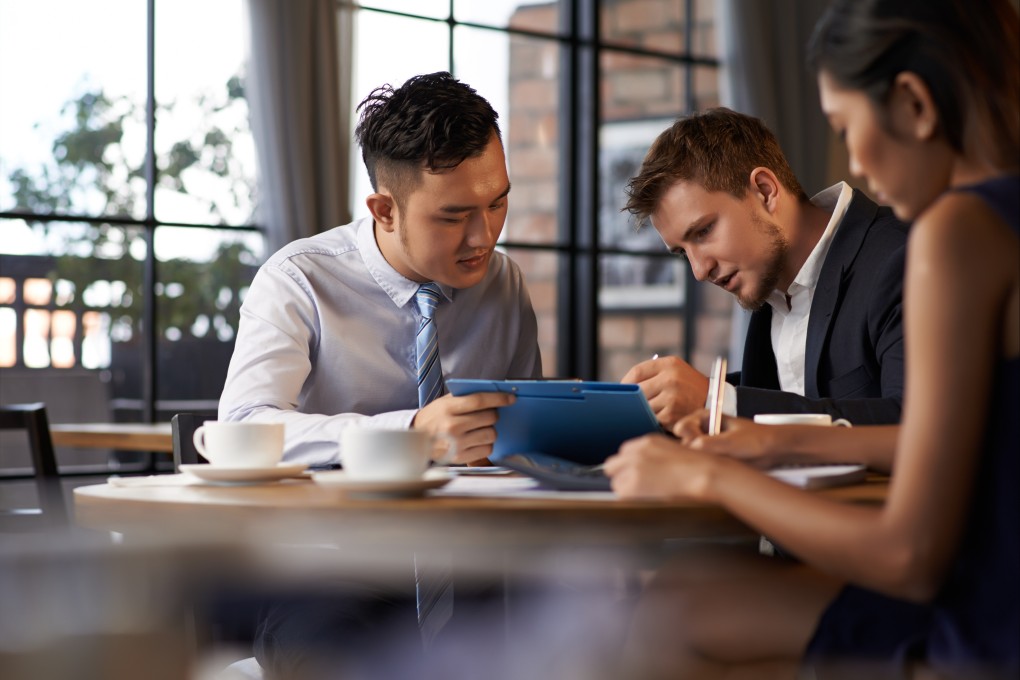 Business school admission officers should aim to predict success in an organisational leadership career, which requires a holistic approach that goes beyond GMAT scores. Photo: Shutterstock
