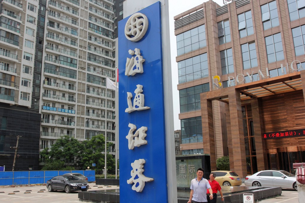 A signboard of Haitong Securities in the Hubei provincial capital of Wuhan city on 19 June 2015. Photo: Imaginechina via AFP.