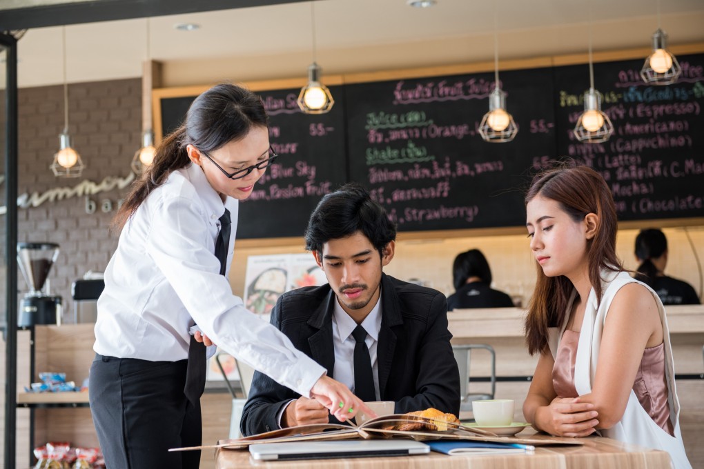 The advance of AI into the catering sector continues, with robot chefs and waiters, but Andrew Sun believes they can’t replace the human touch, especially in higher-end restaurants. Photo: Shutterstock