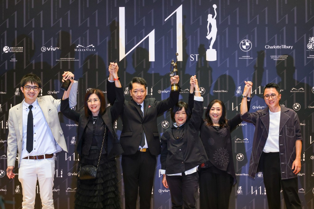 The production team of To My Nineteen-year-old Self pose with their trophies in the press room during the 41st Hong Kong Film Awards. Photo: Dickson Lee