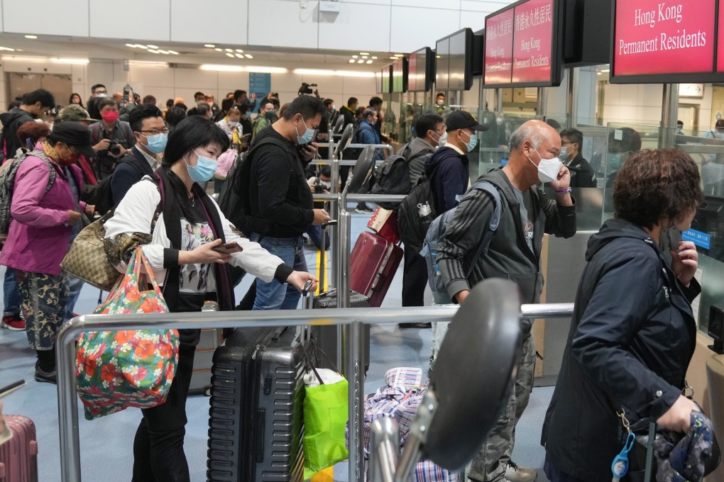 Passengers queue to cross the border at Lo Wu on February 6. Photo: Sam Tsang