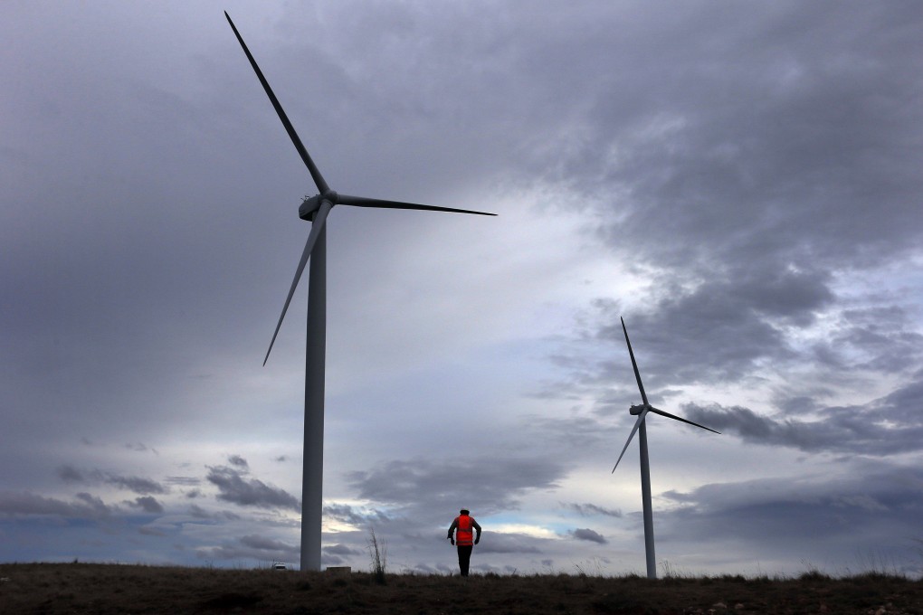 Turbines at a wind farm north of Canberra. Photo: Reuters
