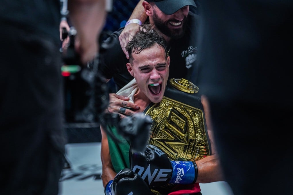Jon Di Bella reacts after beating Zhang Peimian to win the ONE strawweight kickboxing title. Photo: ONE Championship.