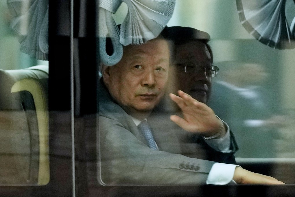 Xia Baolong, the director of the Hong Kong and Macau Affairs office, with Hong Kong Chief Executive John Lee Ka-chiu (back). Photo: Elson Li