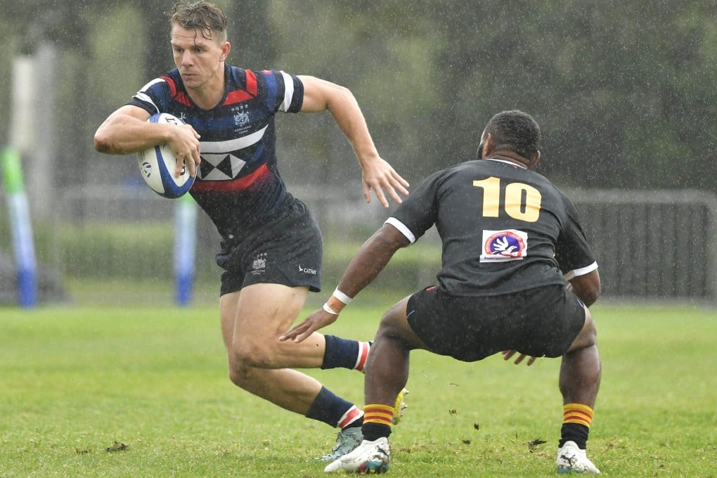 Hong Kong’s Seb Brien attacks in the rain against Papua New Guinea in his side’s first game at the HSBC World Rugby Challenger Series in Stellenbosch, South Africa. Photo: Handout