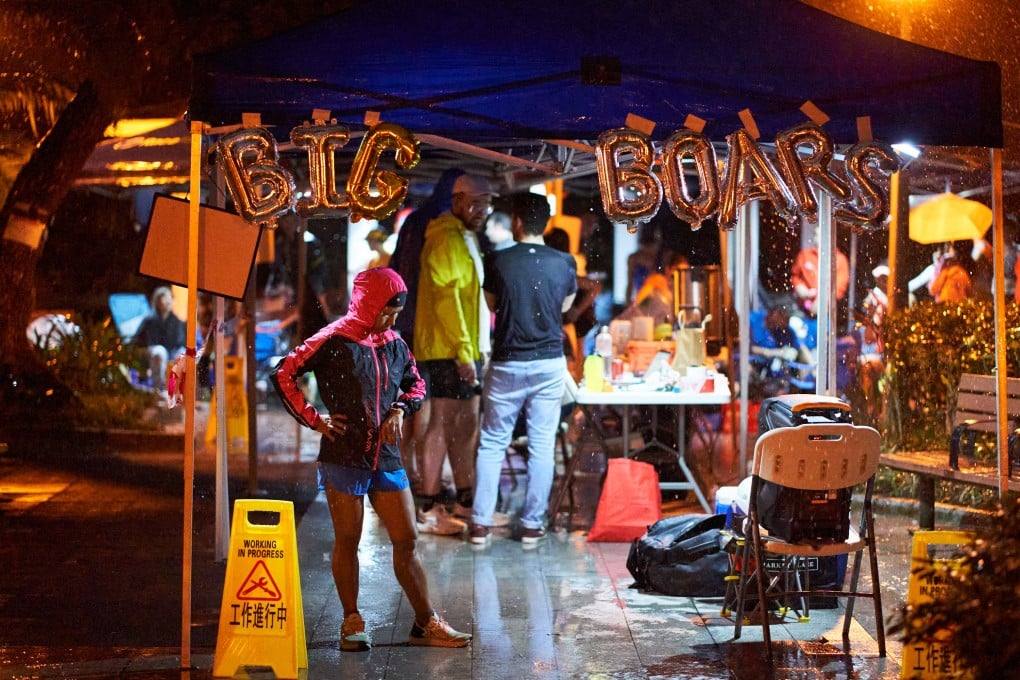 Chamelia Suhra, winner of the 2023 Big Boar’s Backyard Challenge, the race with no end, rests between loops. Photo: Lucien Chan