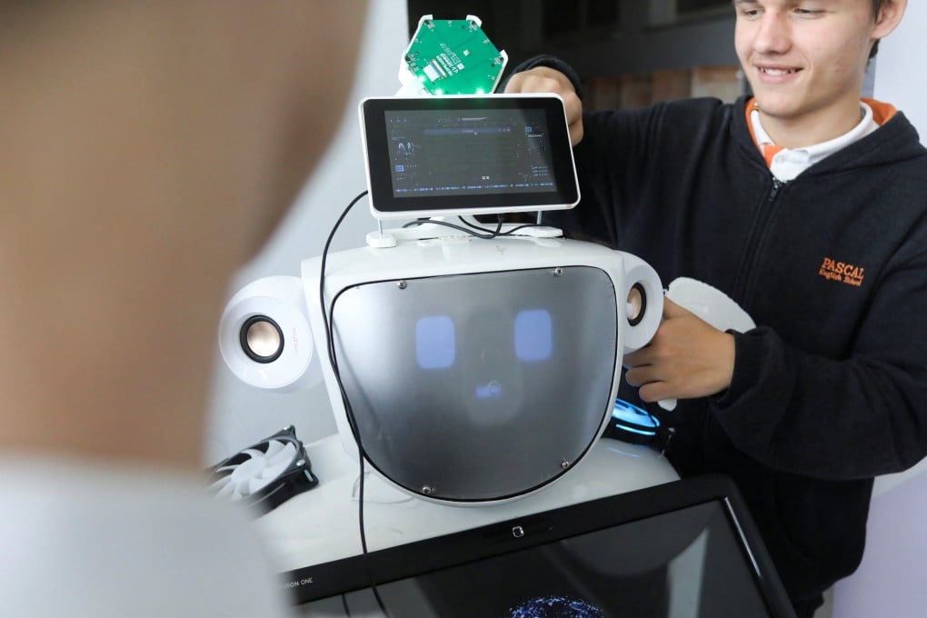 Students work on developing a robot powered by ChatGPT in Nicosia, Cyprus, on March 30. Photo: Reuters