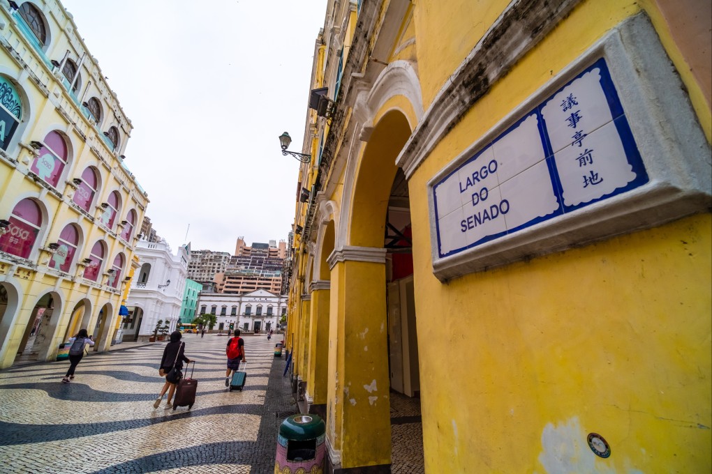 Tourists visit the landmark Senate Square, which is part of the UNESCO Historic Centre of Macau World Heritage Site. Photo: Shutterstock