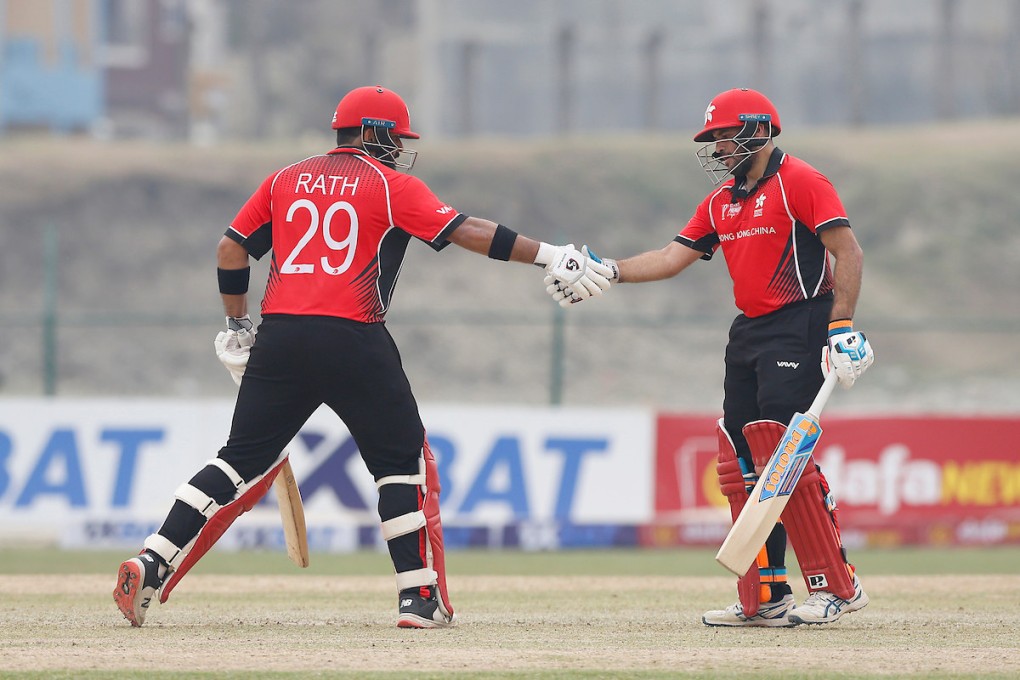 Kinchit Shah (right) congratulates Anshuman Rath for reaching his half century during the ACC Premier Cup matchagainst United Arab Emirates at the Mulpani Cricket Stadium in Kathmandu. Photo: Asian Cricket Council