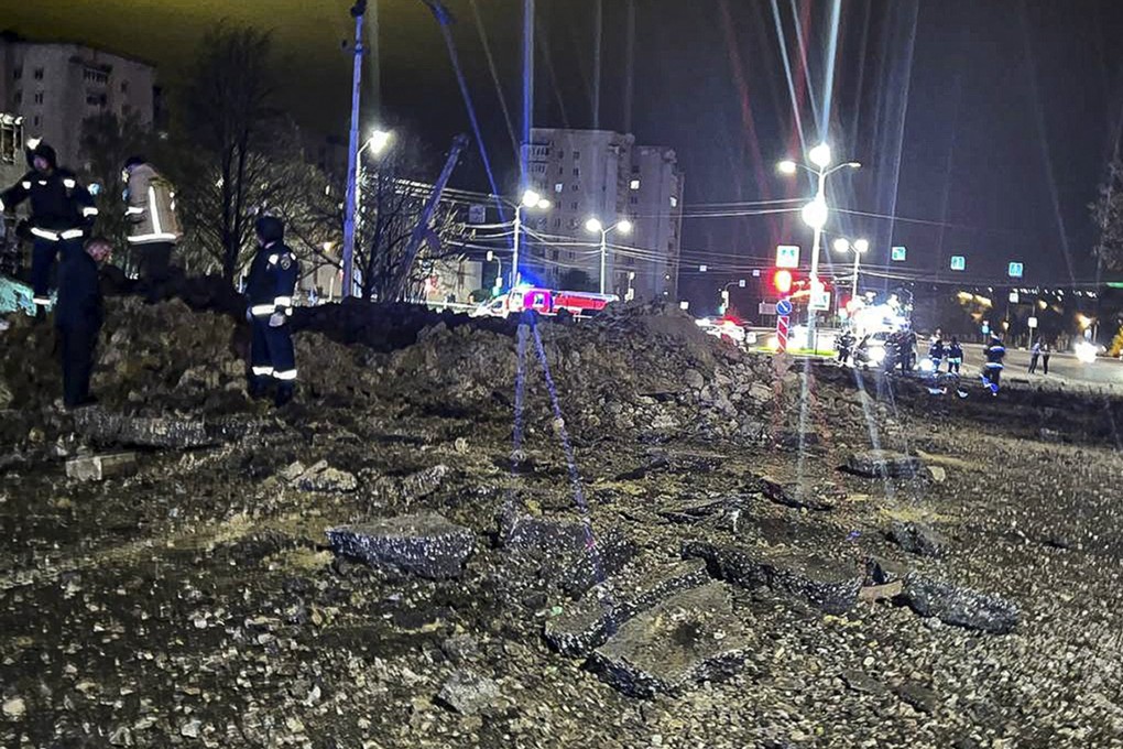 The site of a crater is seen after an explosion in Belgorod, Russia. Photo: Telegram/@vvgladkov via AP