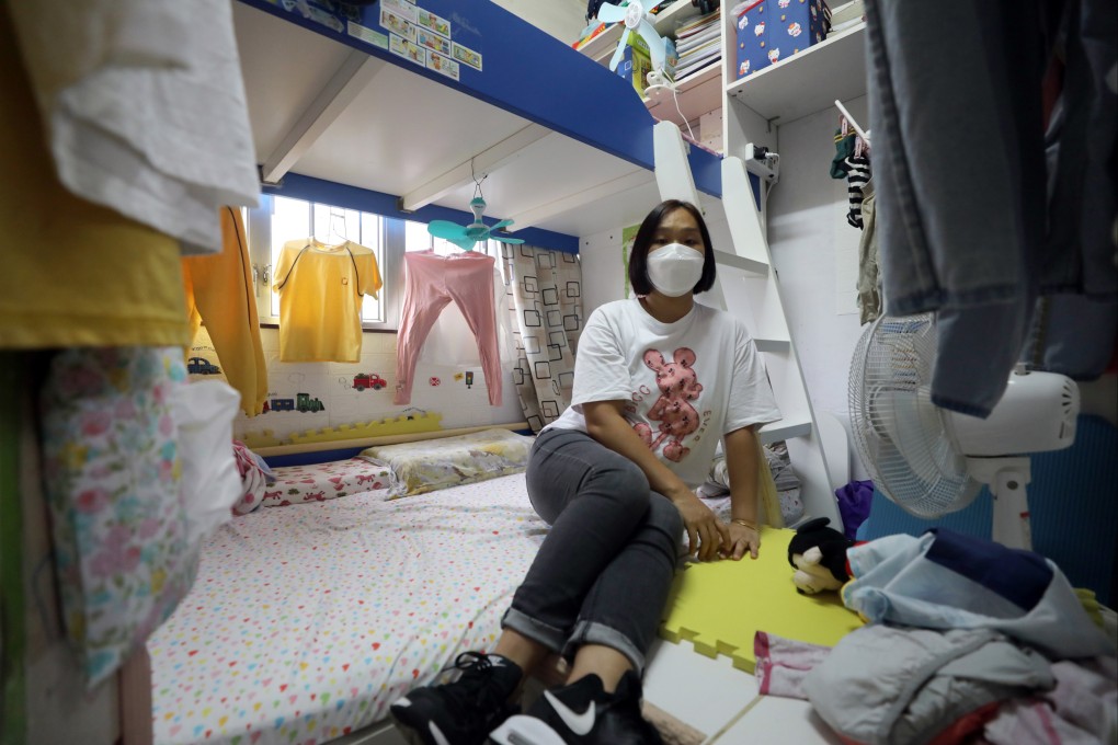 A subdivided flat of less than 150 sq ft in Sham Shui Po houses Zeng Xiaobao, shown in this 2022 photo, as well as her husband and two children. Hong Kong’s subdivided flats are seemingly becoming smaller and more expensive. Photo: Xiaomei Chen