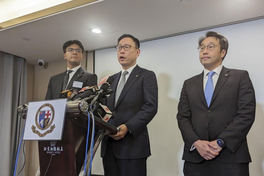 Hong Kong Bar Association chairman Victor Dawes (centre) speaks during a media conference in Beijing on the third day of the trip. Flanking Dawes are vice-chairman Jose Antonio Maurellet (left) and vice-chairman Derek Chan Ching-lung (right). Photo: Kahon Chan