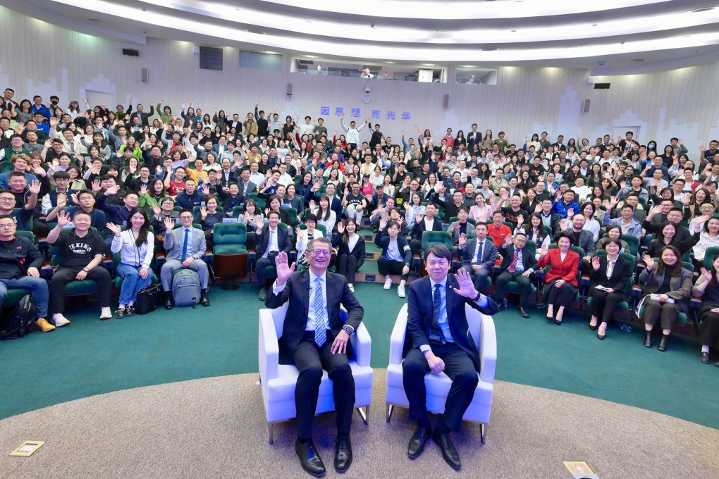 Financial Secretary Paul Chan (left) visits Peking University Guanghua School during his recent four-day trip to Beijing. Photo: Financial secretary blog