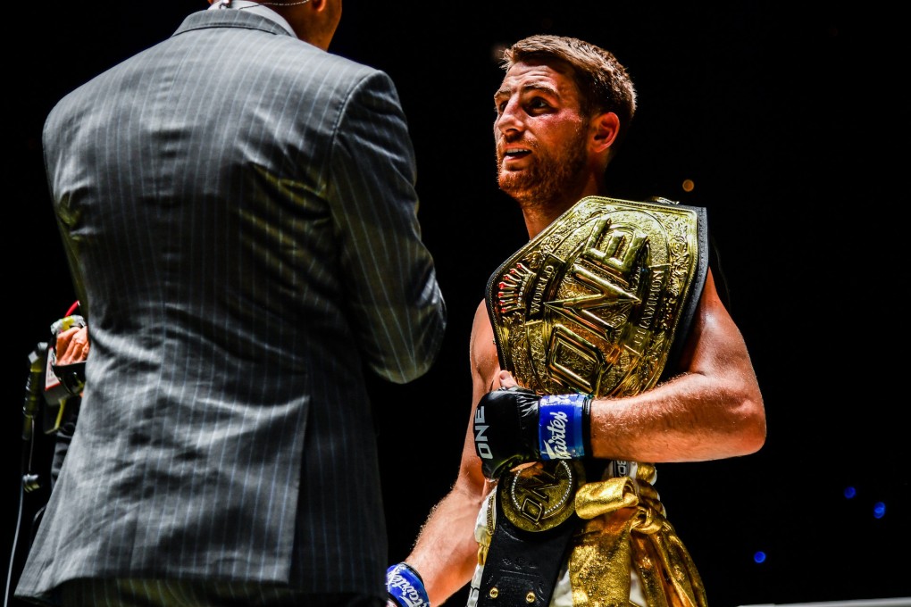 Jonathan Haggerty speaks to commentator Mitch Chilson after winning the ONE bantamweight Muay Thai belt. Photos: ONE Championship.