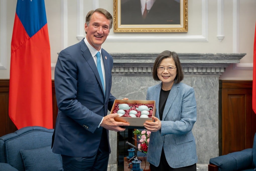 Taiwanese President Tsai Ing-wen and US state of Virginia Governor Glenn Youngkin pose for photographs during their meeting inside the presidential office in Taipei on April 24, 2023. Photo: EPA-EFE