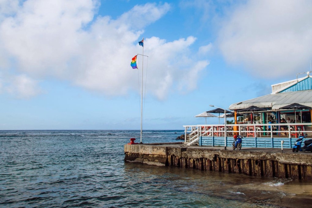 A rainbow flag flies outside a restaurant in the Cook Islands. Lawmakers in the tiny island nation of 15,000 people passed a bill on April 14 to decriminalise same-sex sexual relations. Photo: Facebook/Pride Cook Islands