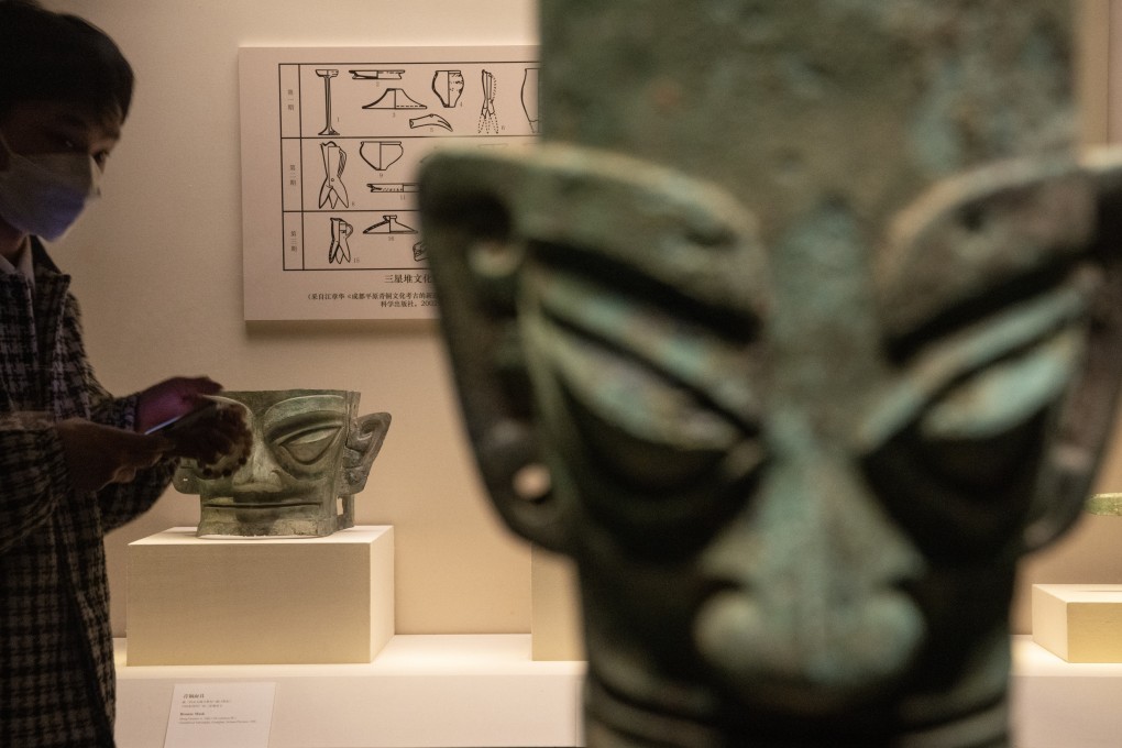 A bronze human head from the Shang Dynasty is displayed at the Ancient China Exhibition, National Museum of China, July 9 2022. Photo: Robert Ng