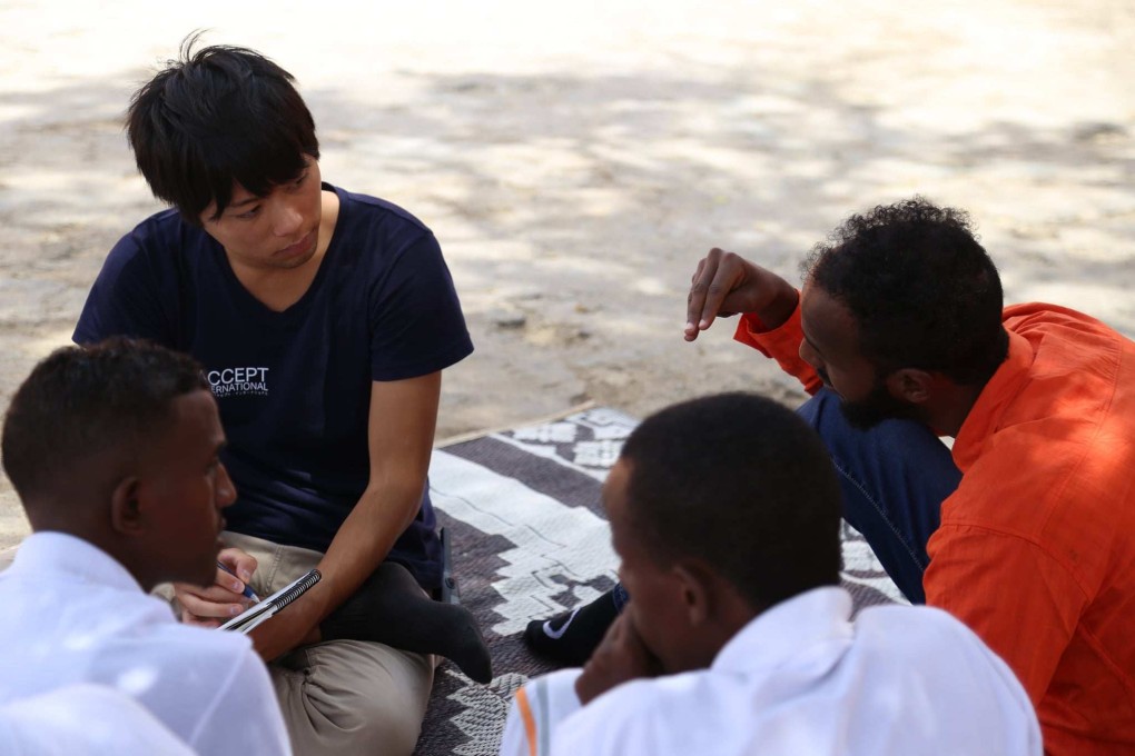 Yosuke Nagai of Accept International. Sometimes Nagai must wear a bulletproof vest, and he always carries emergency medical supplies with him, such as a haemostatic agent used to stop wounds from bleeding. Photo: Facebook/Accept International