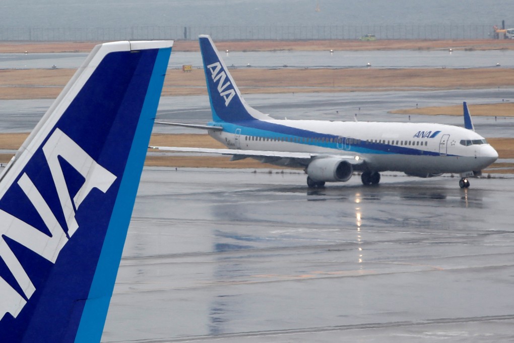 All Nippon Airways’ (ANA) planes at Tokyo’s Haneda airport. Japan’s largest airline has decided to cancel cut-price tickets mistakenly sold because of a currency glitch. Photo: Reuters