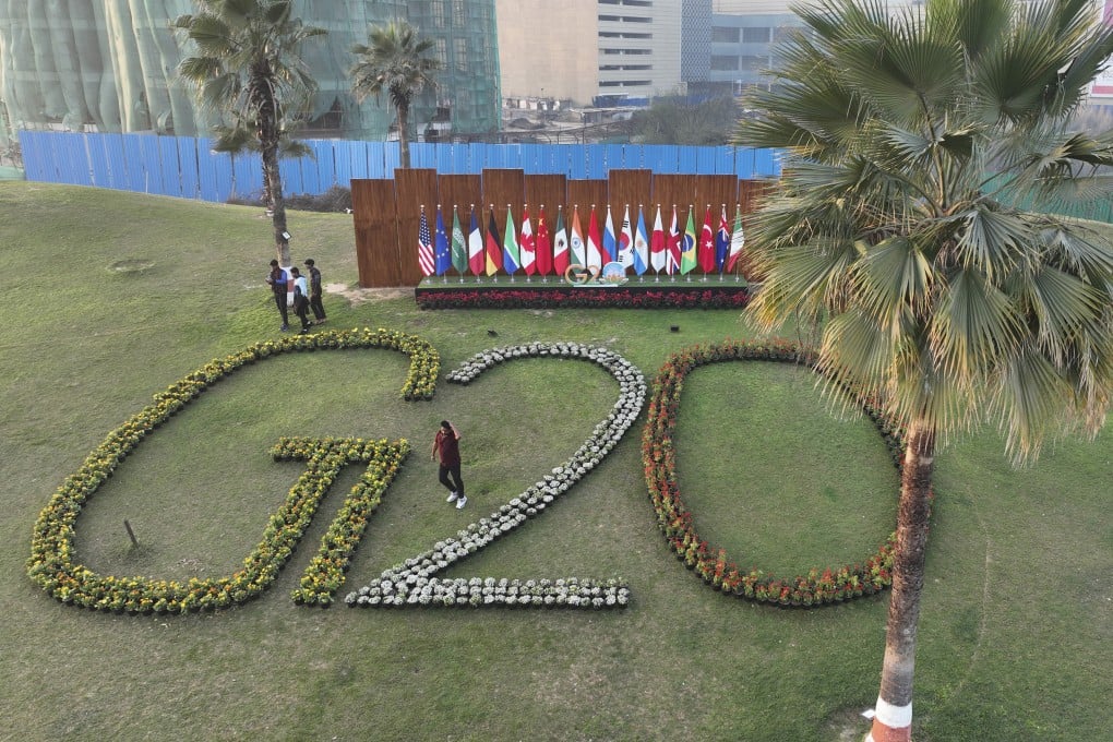 A man walks past a G20 display in Lucknow, India, on February 12. Under its presidency, India is expected to hold more than 200 meetings in the run-up to the G20 summit. Photo: AP