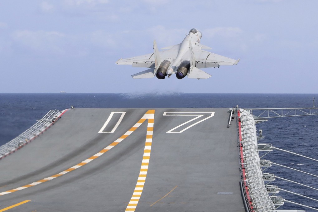 A J-15 Chinese fighter jet takes off from the Shandong aircraft carrier during exercises around Taiwan on April 9. Photo: Xinhua