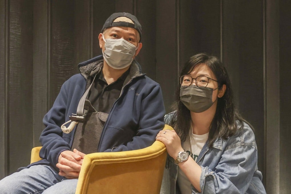 Brain cancer patient Leung King-yin with his daughter, Sharon. Leung, who is undergoing TTFields treatment, is wearing the TTFields cap under his baseball cap and is carrying the bag containing the cap’s battery pack. Photo: Jonathan Wong