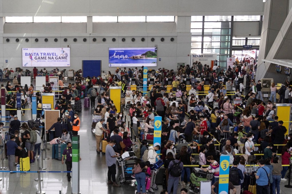 Passengers queueing at the Ninoy Aquino International Airport, in Pasay City, Metro Manila, Philippines. Photo: Reuters