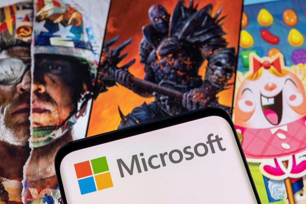 Microsoft’s logo is seen on a smartphone in front of a display of Activision Blizzard video game characters on January 18, 2022. Photo: Reuters