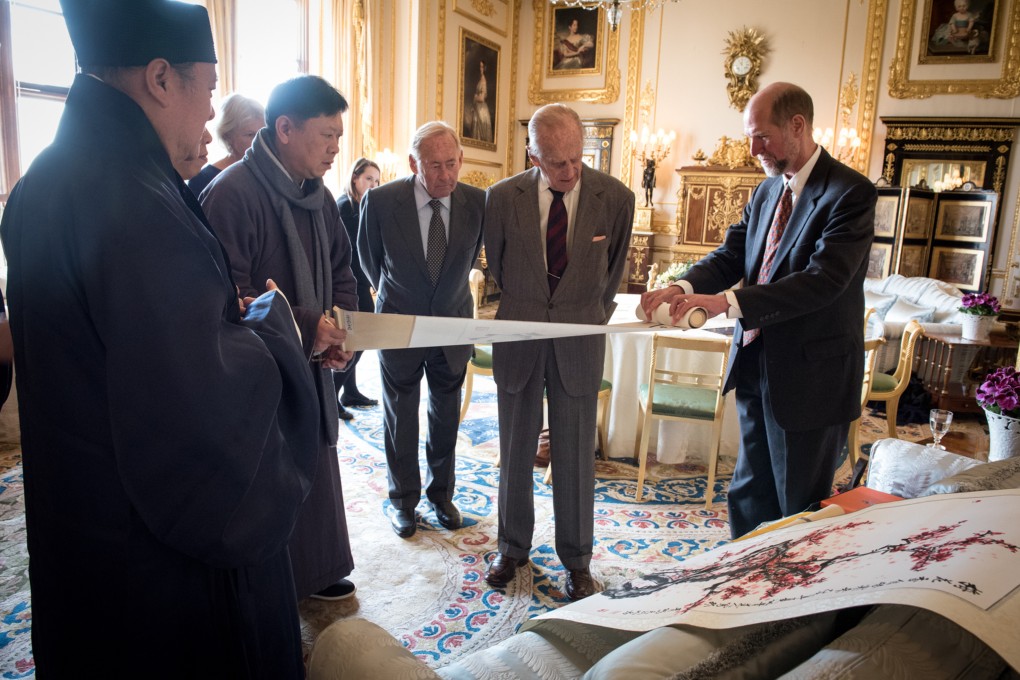 FaithInvest CEO Martin Palmer (right) at Britain’s Windsor Castle in 2017 for  a meeting between Daoist leaders and Prince Philip (second right). FaithInvest works with the Daoists and other religious groups to direct their finances towards fighting climate change. Photo: FaithInvest