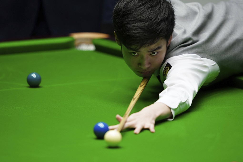 China’s Si Jiahui in action against Belgium’s Luca Brecel on day 14 of the World Snooker Championship at the Crucible Theatre in Sheffield. Photo: AP