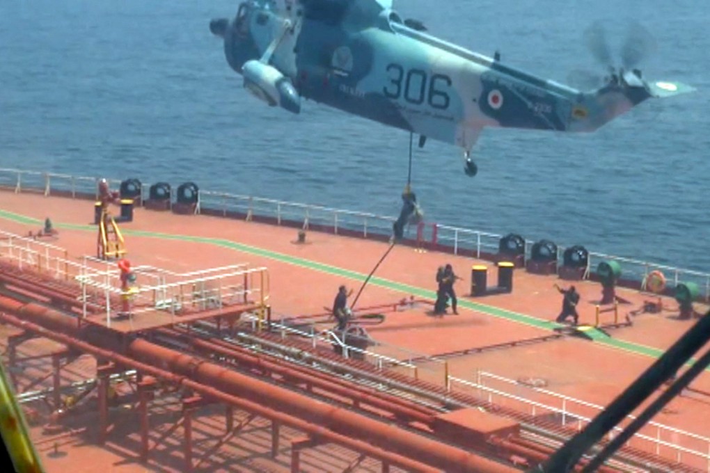This grab taken from a video released by Iran’s Army office shows Iranian naval soldiers boarding the Advantage Sweet oil tanker off the coast of Oman. Photo: AFP