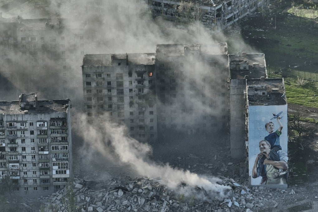 Smoke rises from a building in Bakhmut, the site of the heaviest battles between Ukrainian and Russian troops in the Donetsk region, Ukraine. Photo: AP