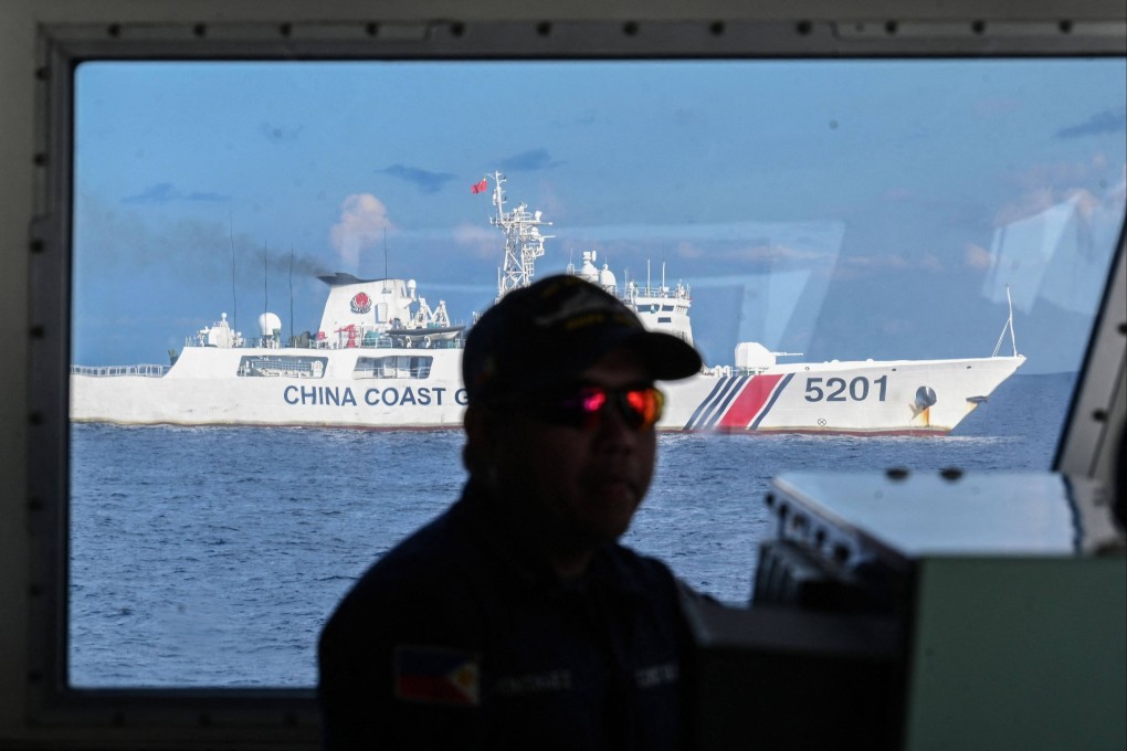 A Chinese coastguard ship shadows a Philippine vessel during a patrol of the disputed Spratly Island in the South China Sea earlier this month. Photo: AFP