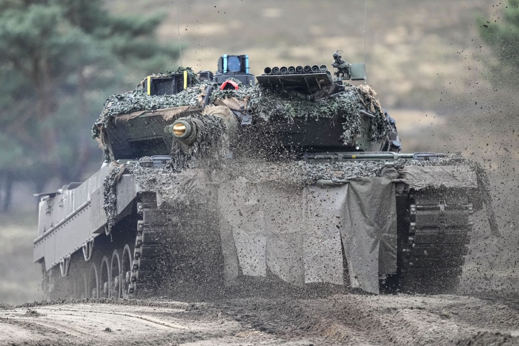 A Leopard 2 tank undergoes drills at the Bundeswehr tank battalion 203 at the Field Marshal Rommel Barracks in Augustdorf, Germany, on February 1. An independent Sweden-based watchdog says world military spending has grown for the eighth consecutive year to an all-time high of US$2.24 trillion, with 13 per cent of the rise taking place in Europe, chiefly because of Russian and Ukrainian spending. Photo: AP