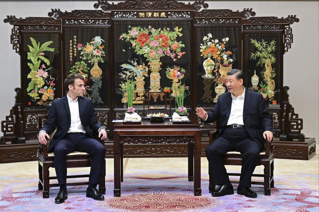 Chinese President Xi Jinping and French President Emmanuel Macron chat over tea at the Pine Garden in Guangzhou on April 7. Photo: Xinhua