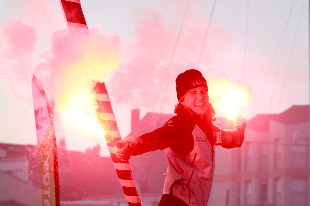 Clarisse Cremer celebrates finishing the 2020 Vendee Globe. Photo: Reuters