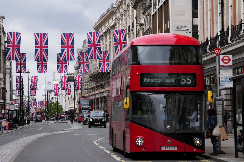 London’s Oxford Street and many other places across Britain have been decorated with flags ahead of the May 6 coronation of King Charles. But not everyone is behind the event. Photo: Reuters