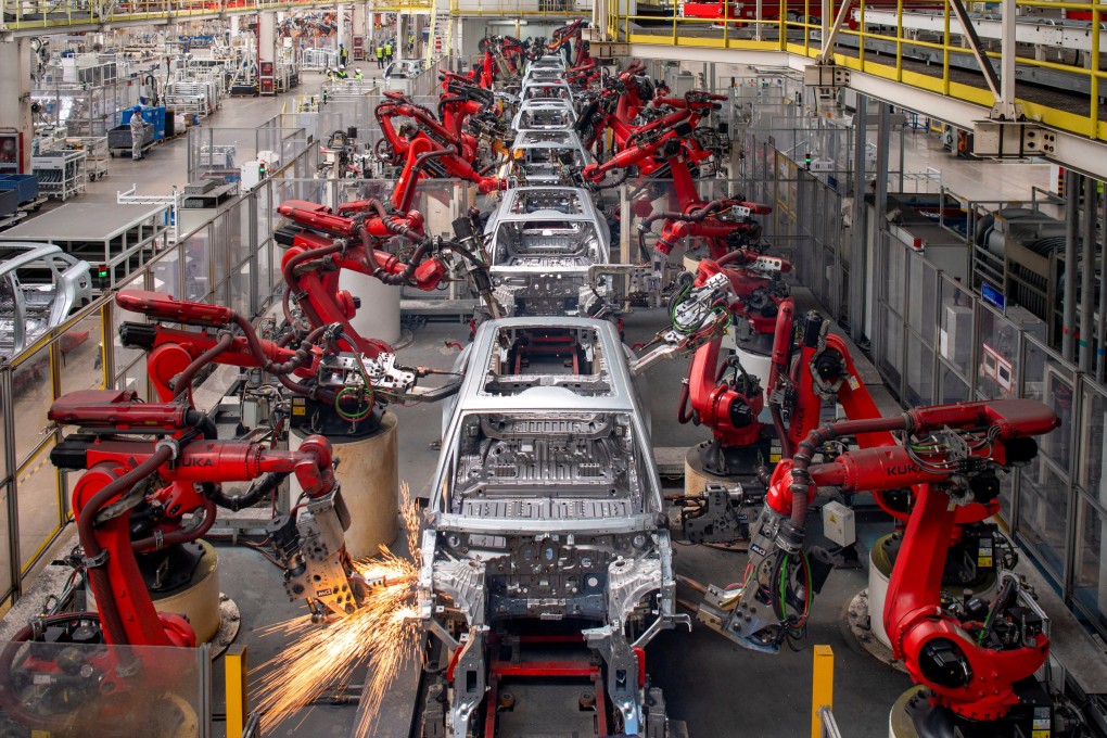 Robotic arms assemble cars on the production line for Leapmotor’s electric vehicles at a factory in Jinhua, Zhejiang province, on April 26. Photo: Reuters