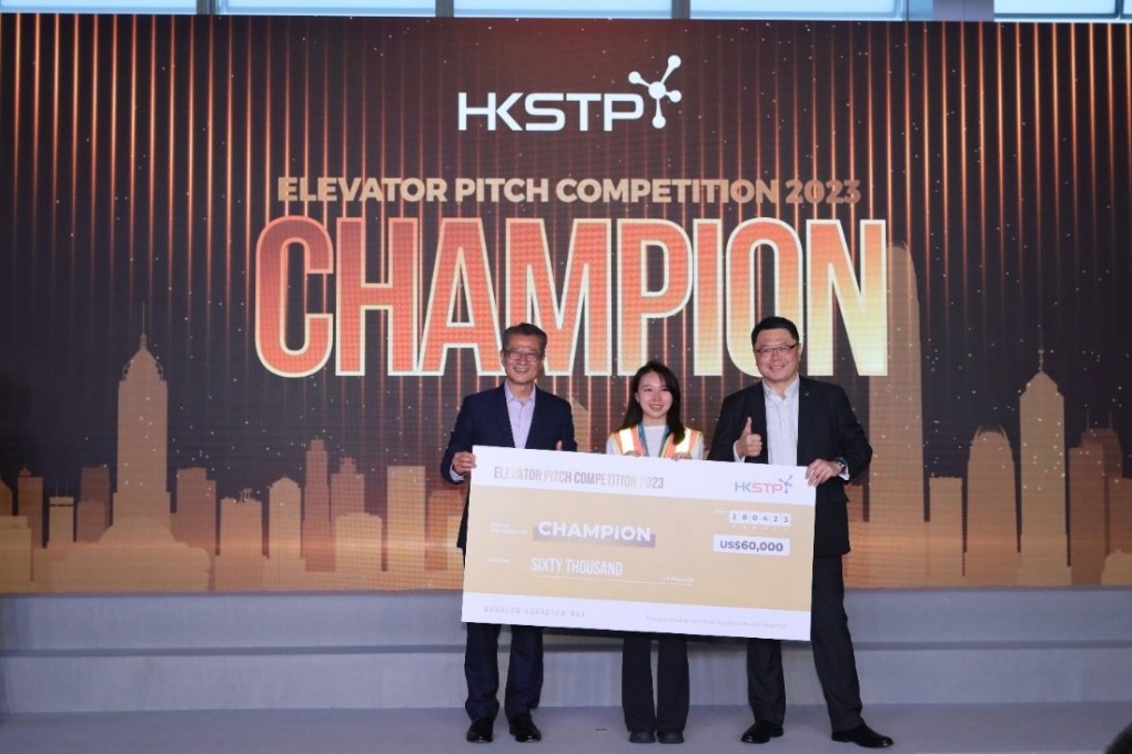 Paul Chan, Financial Secretary of Hong Kong SAR (left) and Dr Sunny Chai, Chairman of HKSTP (right), presenting the overall champion award to Skyland Innovation. Photo: Handout