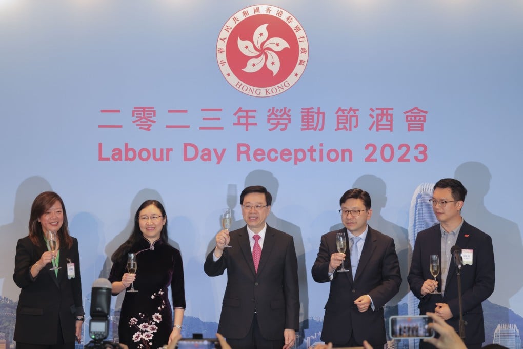 Hong Kong Chief Executive John Lee Ka-chiu (centre) and others at the Labour Day Reception in Wan Chai on Friday. Photo: Jelly Tse