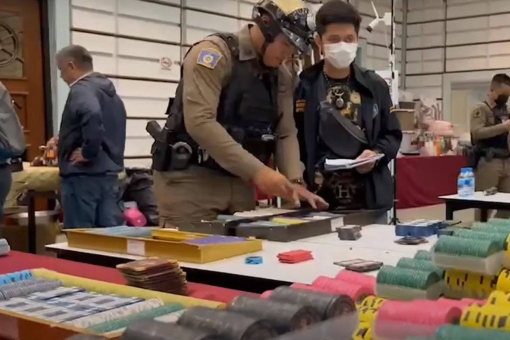 Several gambling tables, chips and cards, CCTV cameras, smartphones and wads of Indian currency were also seized. Police believe millions of rupees were circulated in the casino. Photo: YouTube/Pattaya News