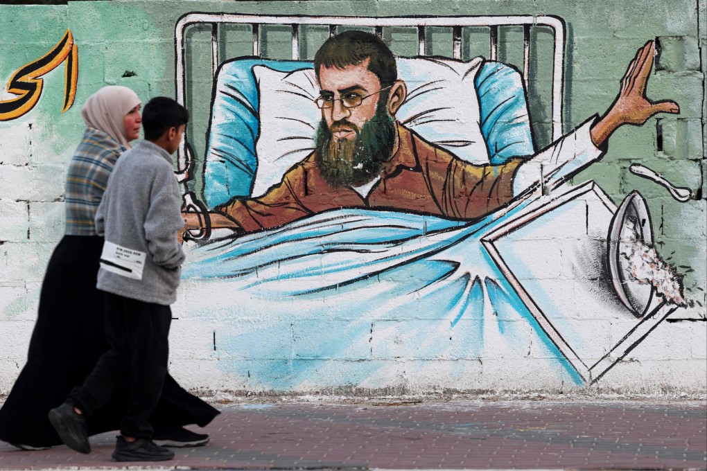 A mural in Gaza City depicting Khader Adnan, a top figure in the Islamic Jihad group. Photo: AFP