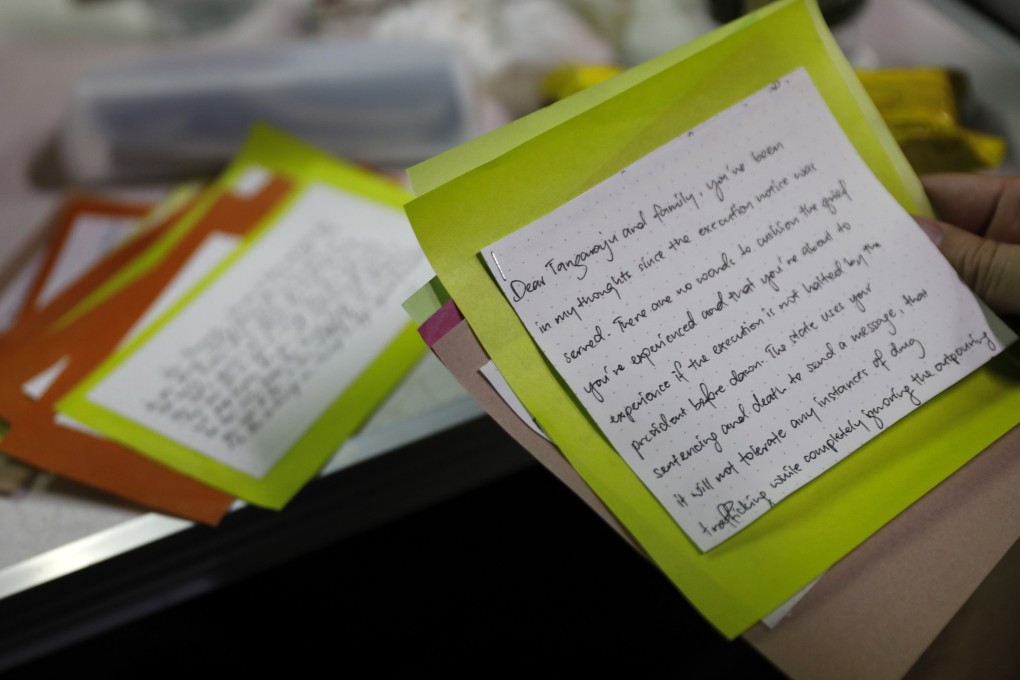 Activists read letters of support from the public for death row inmate Tangaraju Suppiah during a vigil for him at a private office in Singapore on April 26. Countries hold differing but legitimate positions on capital punishment. The UN should continue to facilitate dialogue on the subject, aimed at bridging differences. Photo: EPA-EFE