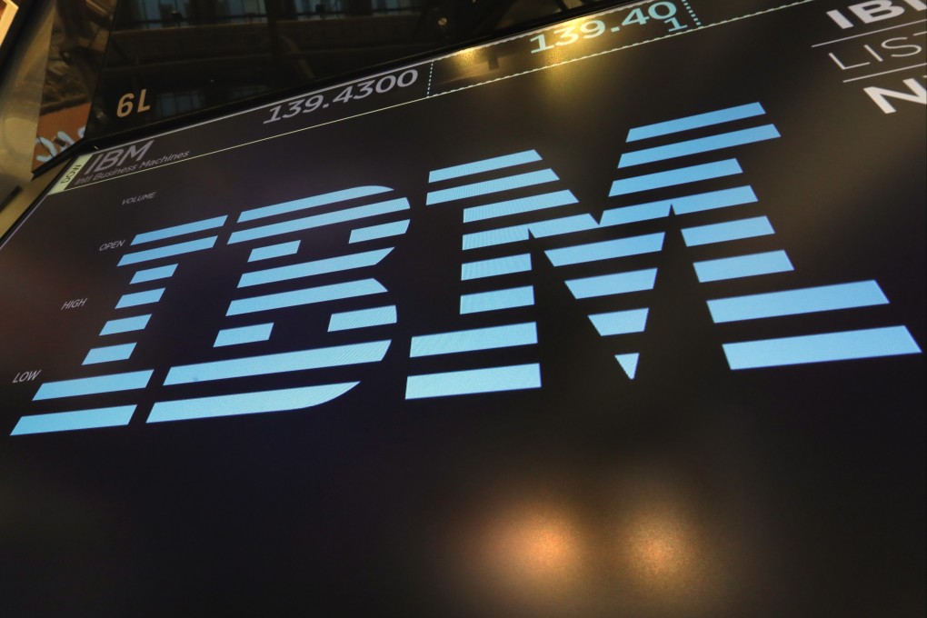 The logo for IBM appears above a trading post on the floor of the New York Stock Exchange. Photo: AP